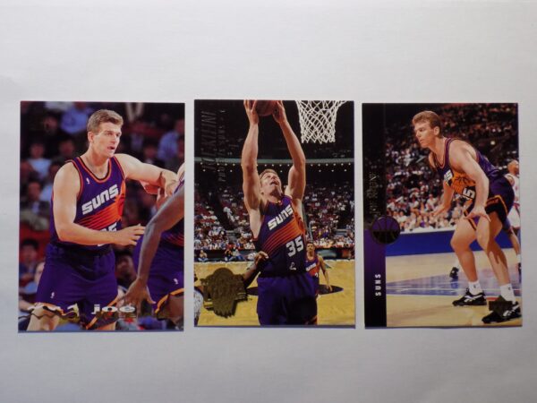 Three basketball cards with Kleine, Joe players on them.