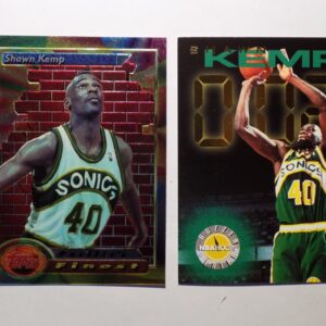 A pair of Kemp, Shawn basketball cards with two players on them.