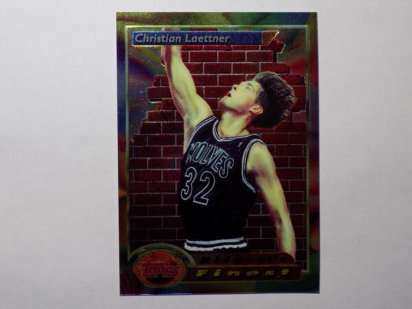 A Laettner, Christian card with a basketball player on it.