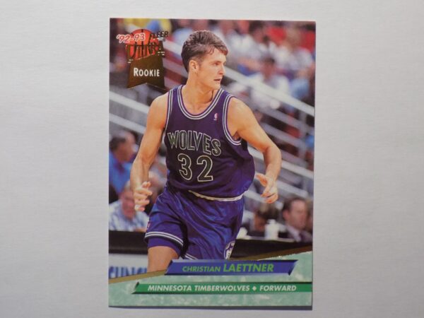 A Laettner, Christian card with a man in a purple uniform.