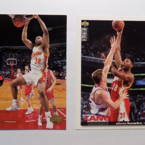 A pair of Lang, Andrew basketball cards with two players in action.