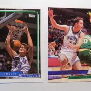 A pair of basketball cards with Luc Longley in the dunk.