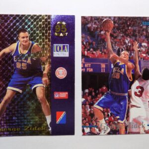 A pair of Zidek, George basketball cards with two players on them.