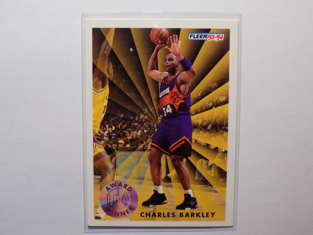 A basketball card with Charles Barkley on it.