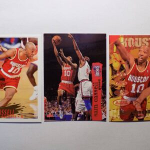 Three Cassell, Sam basketball cards with different players on them.