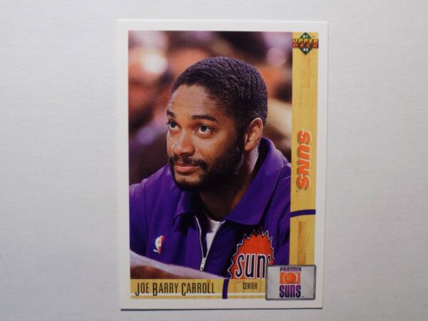 A basketball card with Carroll, Joe Barry wearing a purple shirt.