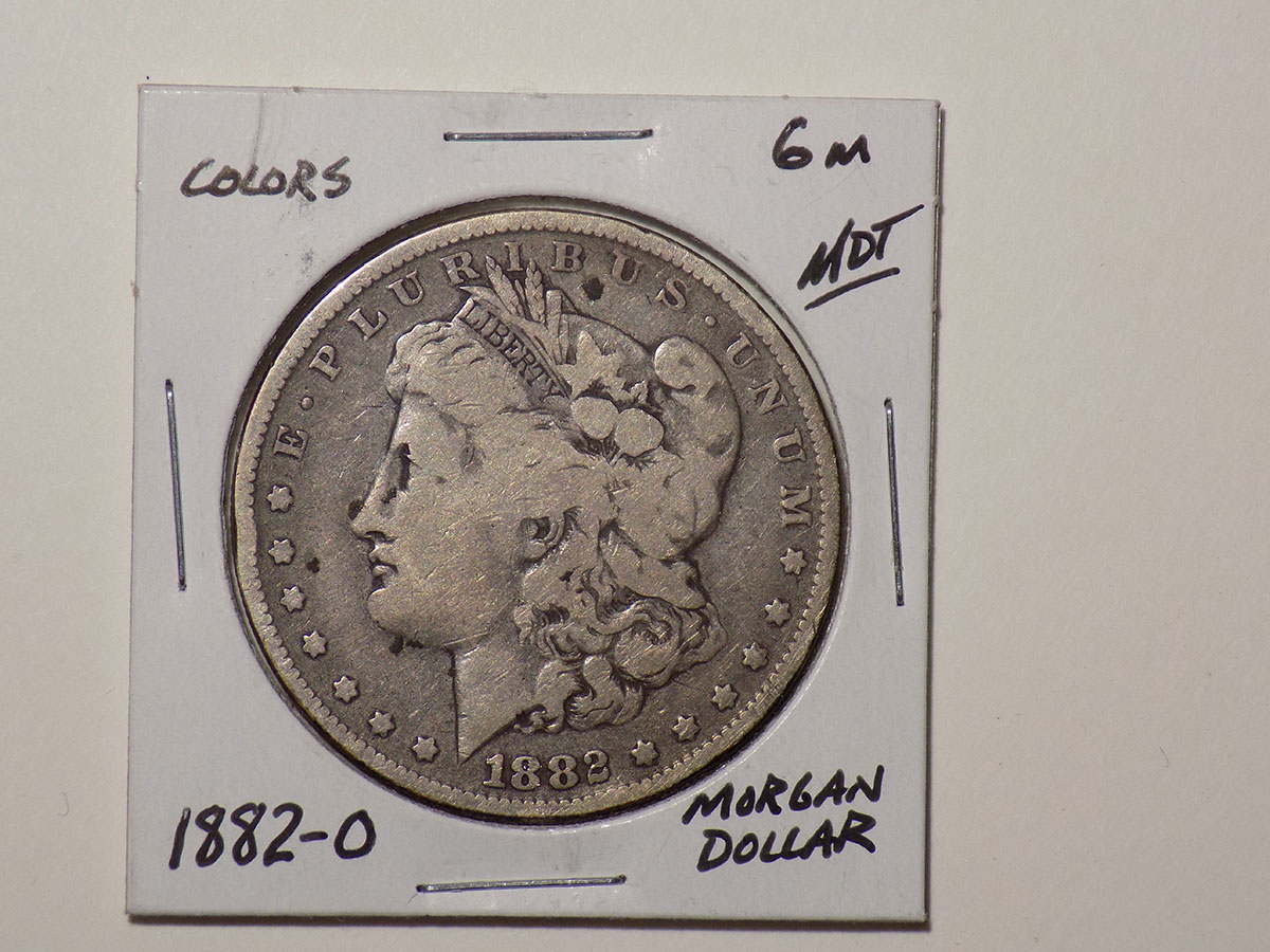 1882 Morgan silver dollar coin.