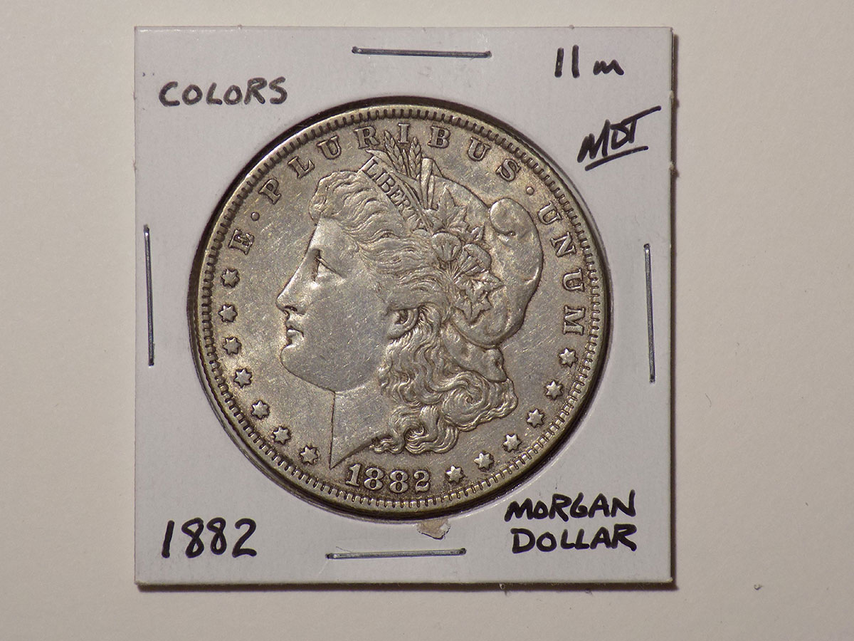 1882 Morgan silver dollar coin.