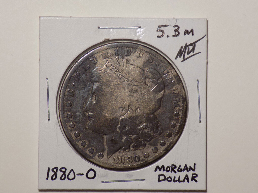 1880 Morgan silver dollar coin.