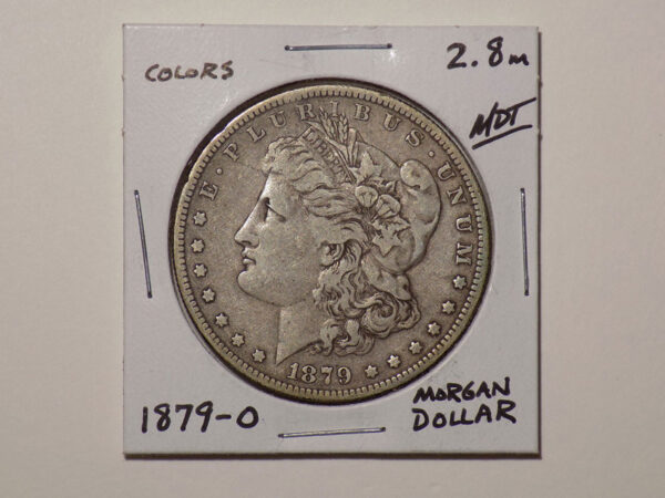 1879 Morgan silver dollar coin.