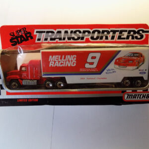 Matchbox red truck hauling race car.