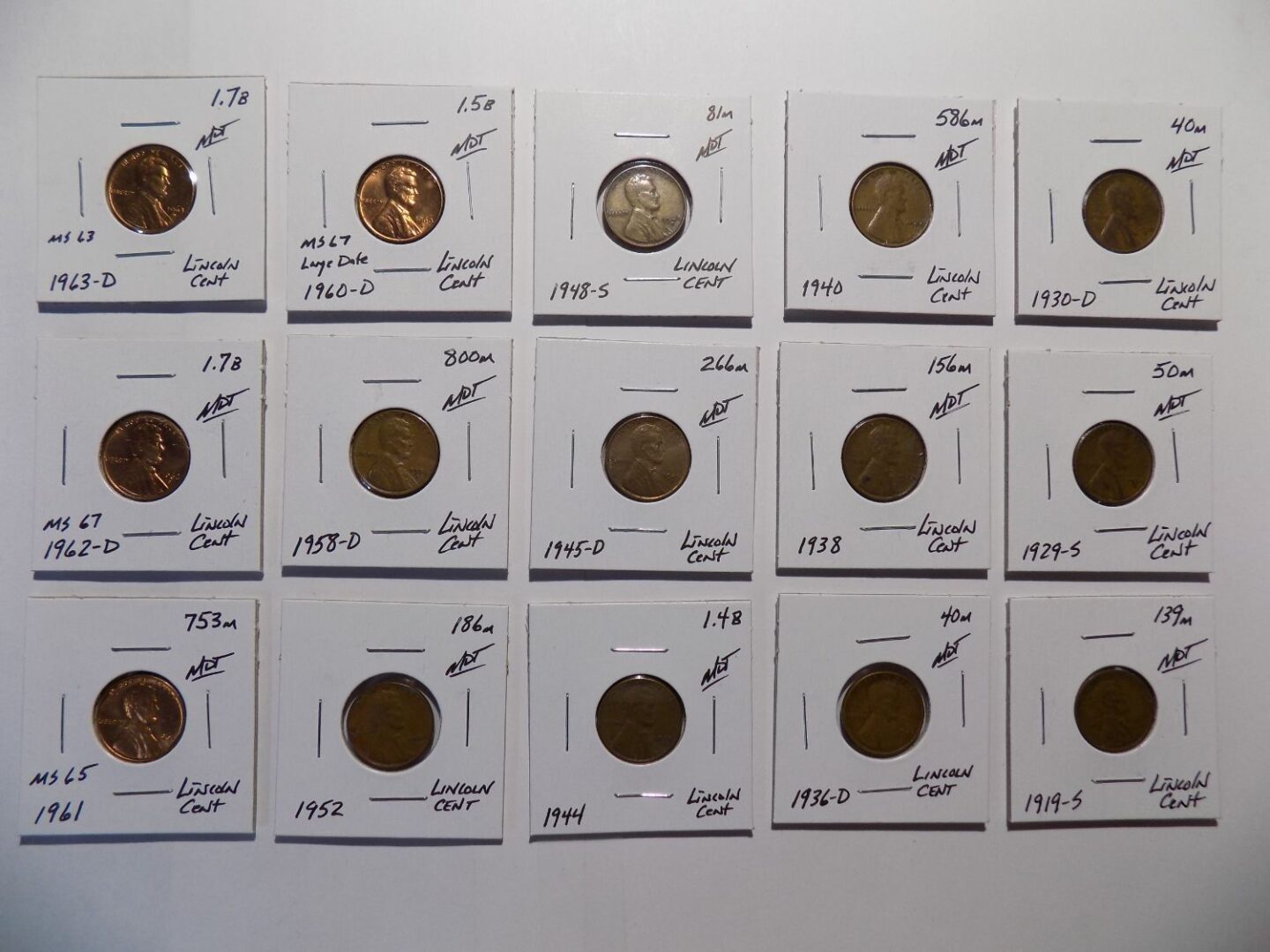 Collection of Lincoln copper cents in holders.