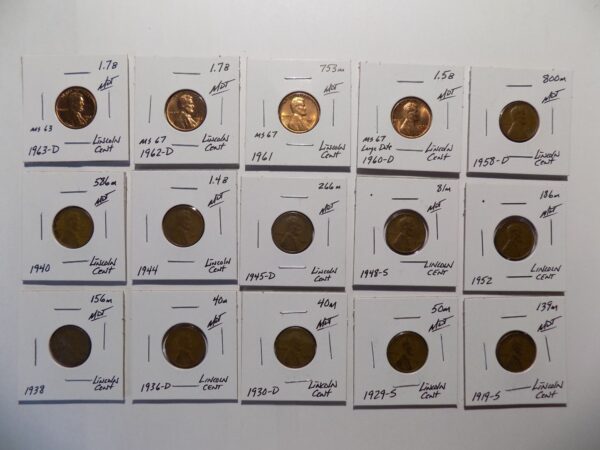 Collection of Lincoln cent coins in holders.