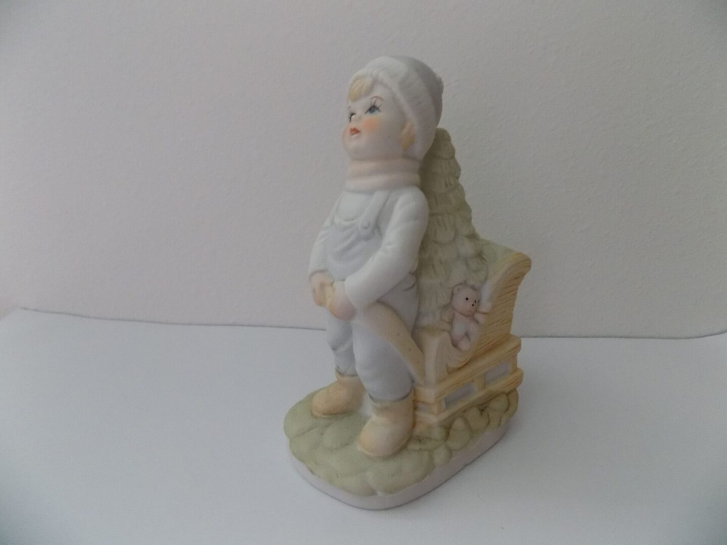 Christmas Boy with Sleigh and Tree Ceramic Figurine