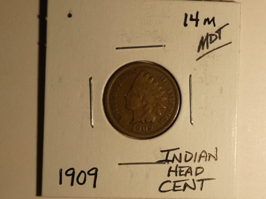 1909 Indian Head one cent coin.