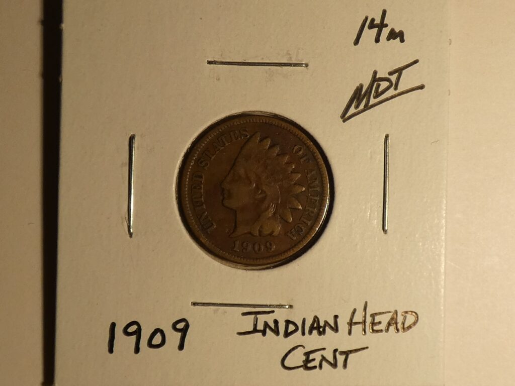 1909 Indian Head one cent coin.