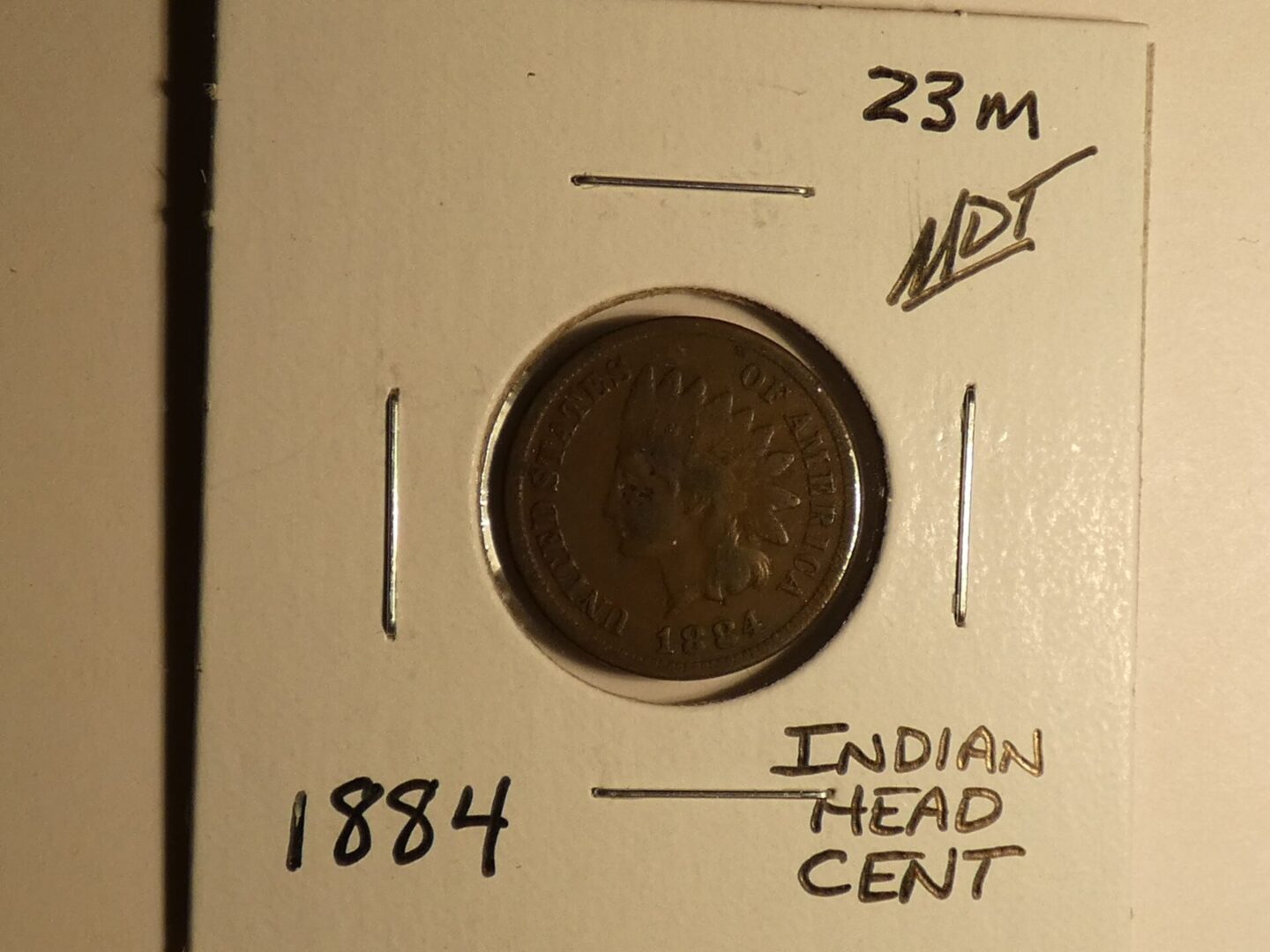 1884 Indian Head copper cent coin.