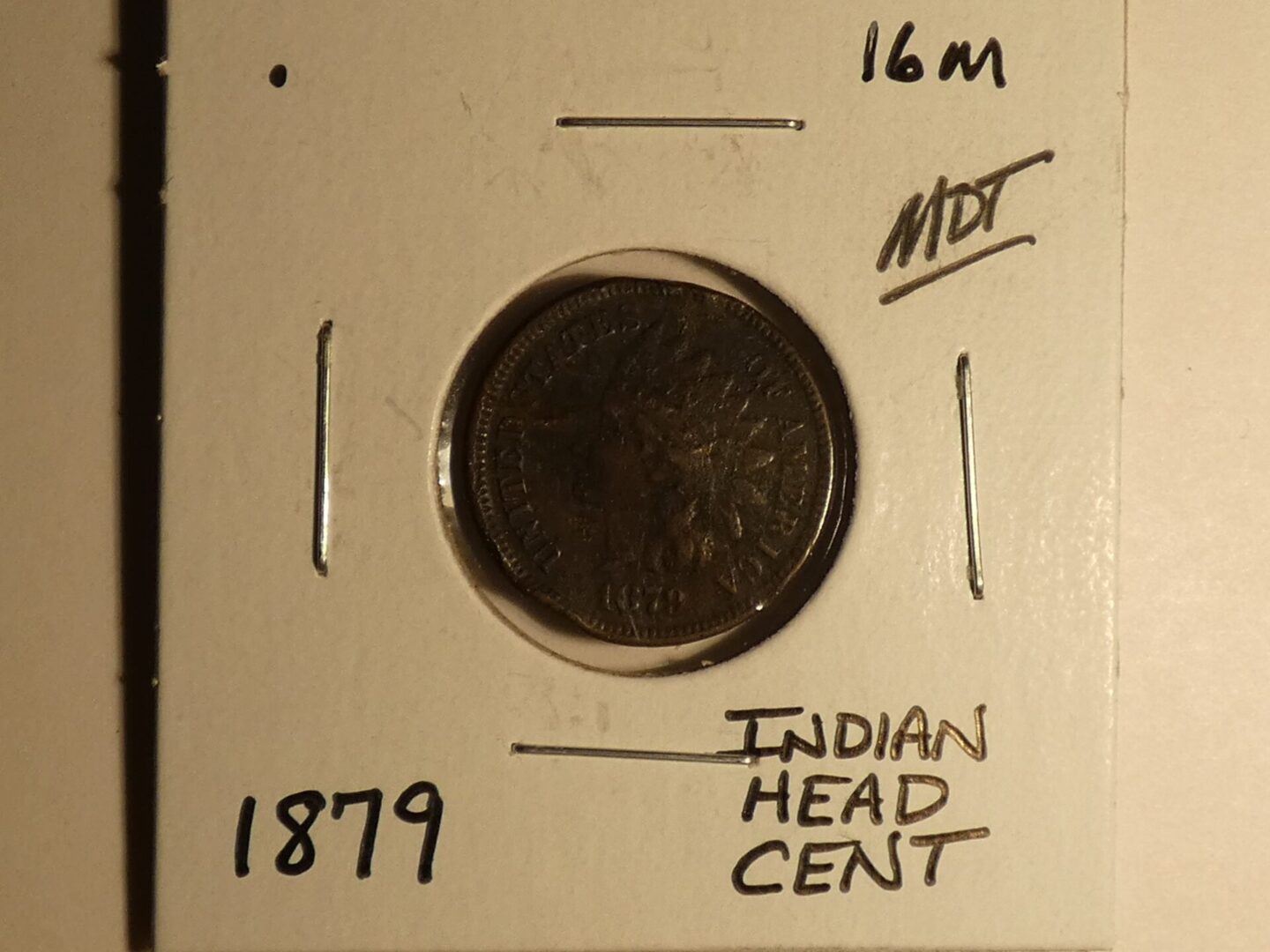 1879 Indian Head cent coin.