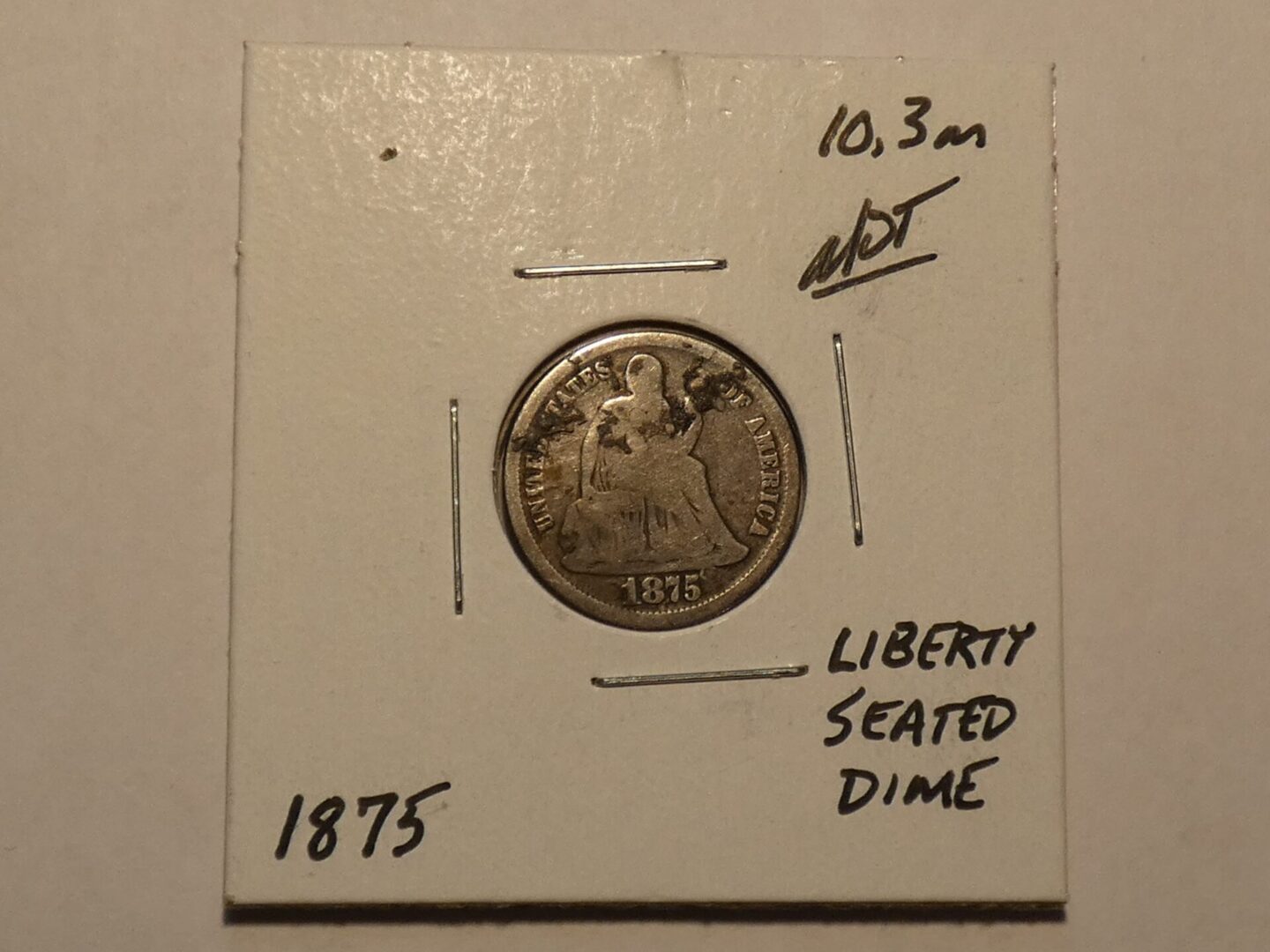 1875 Liberty Seated Dime coin.