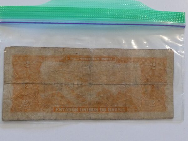 Old Brazilian 2 milreis banknote in bag.