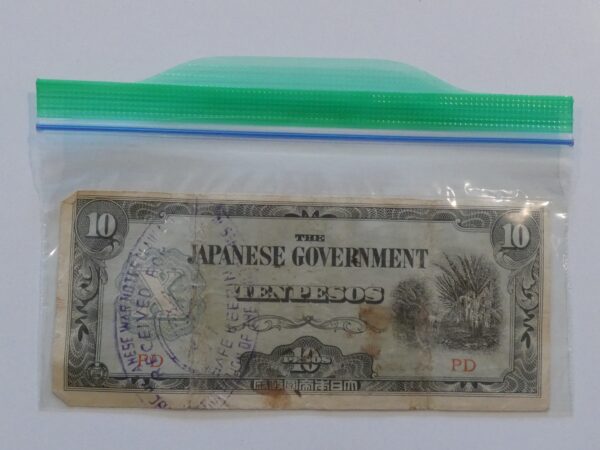 Japanese Government ten peso banknote in plastic bag.