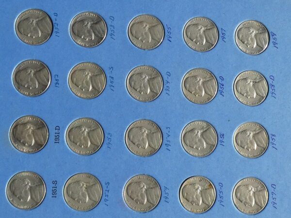 Silver US half dollar coins from 1951-1958.