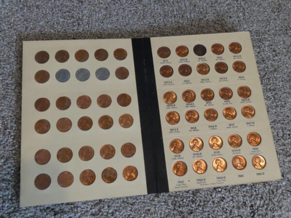 Collection of US penny coins from 1951-1961.