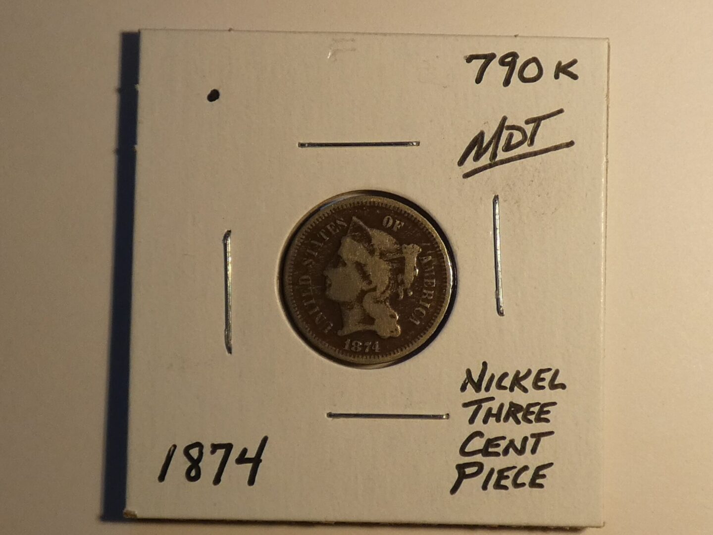 1874 United States three-cent nickel coin.