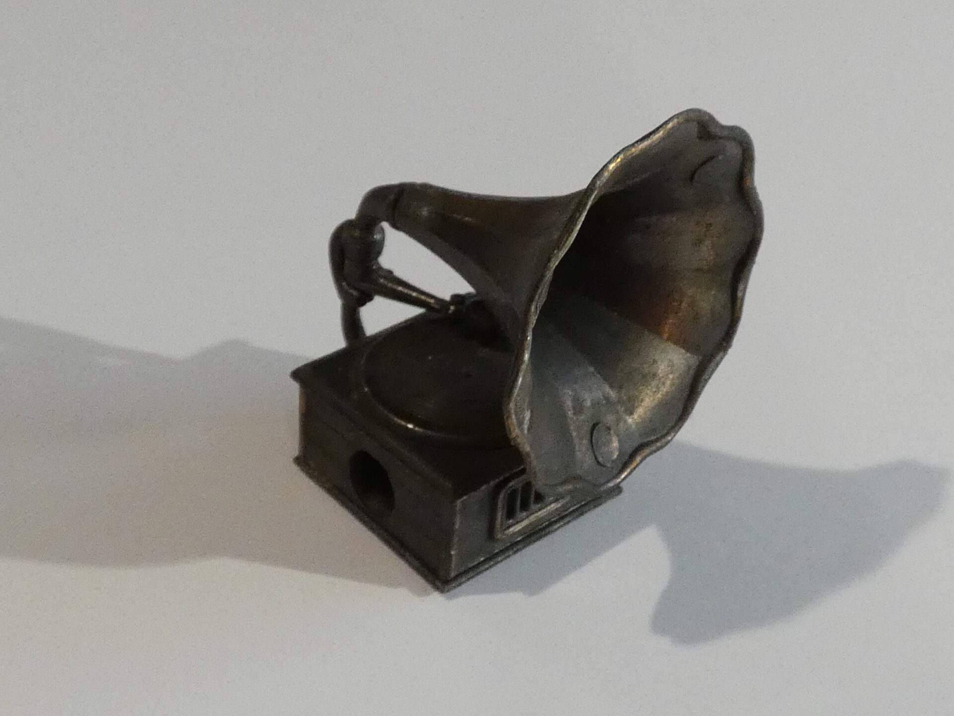 Vintage metal gramophone pencil sharpener.