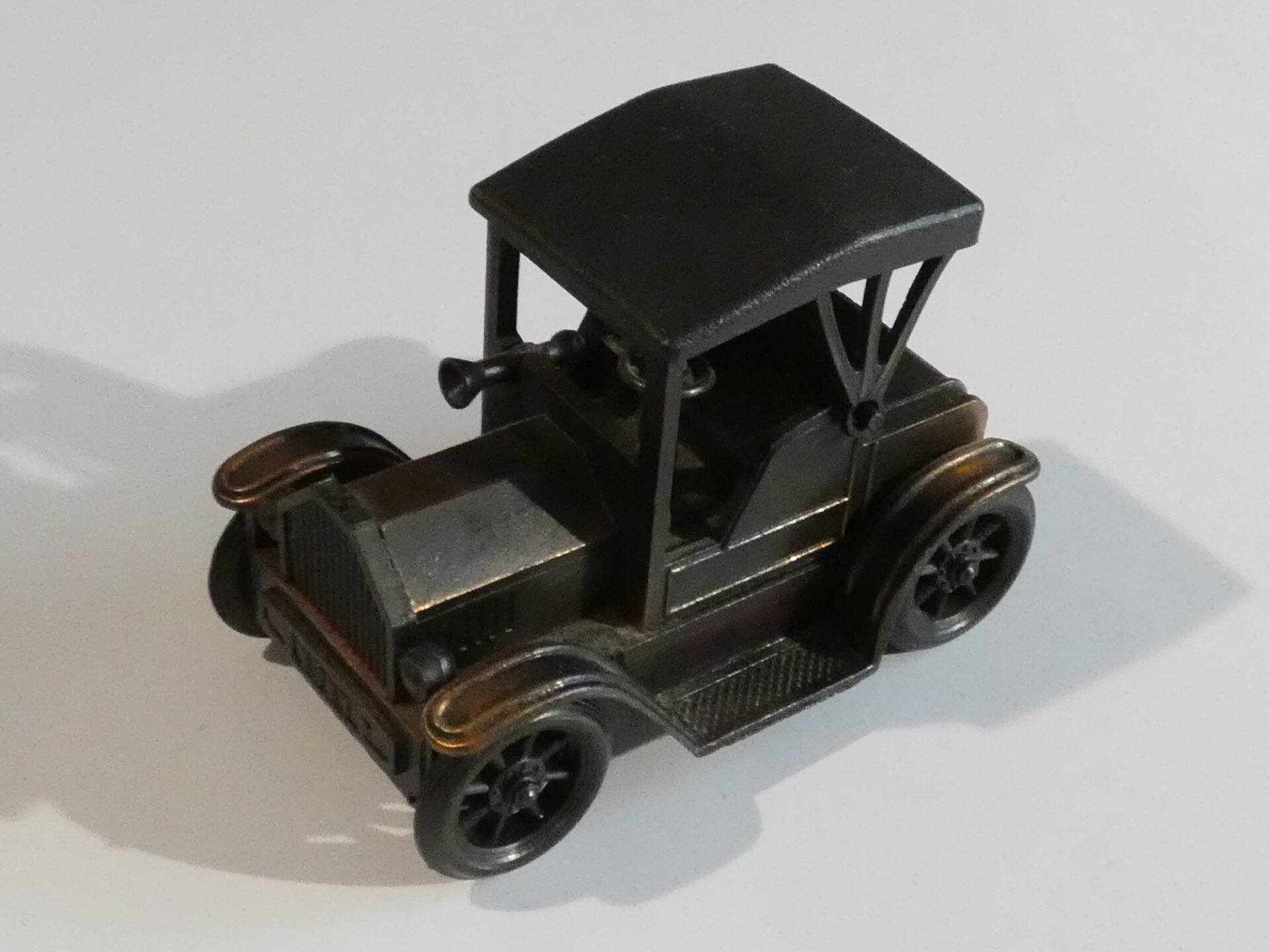 Black vintage car pencil sharpener.