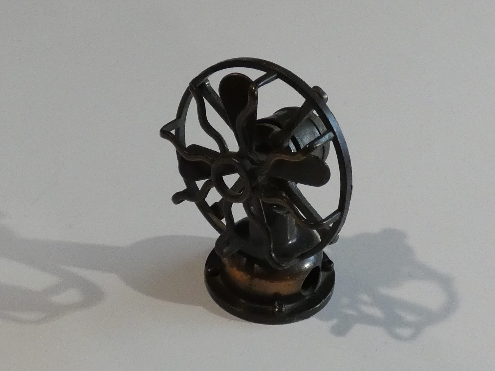 Metal fan pencil sharpener with blades.