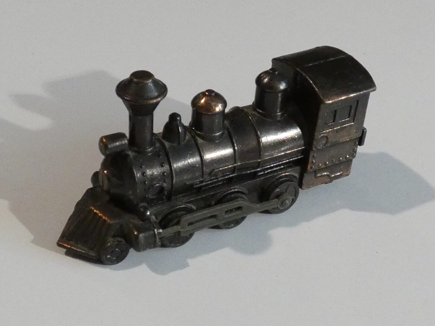 Vintage metal locomotive pencil sharpener.