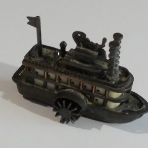 Vintage metal toy steamboat pencil sharpener.