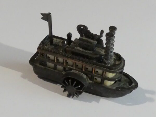 Vintage metal toy steamboat pencil sharpener.