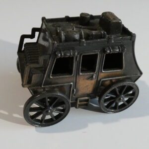 Black metal toy stagecoach with four wheels.