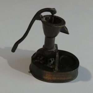 Vintage well pump pencil sharpener.