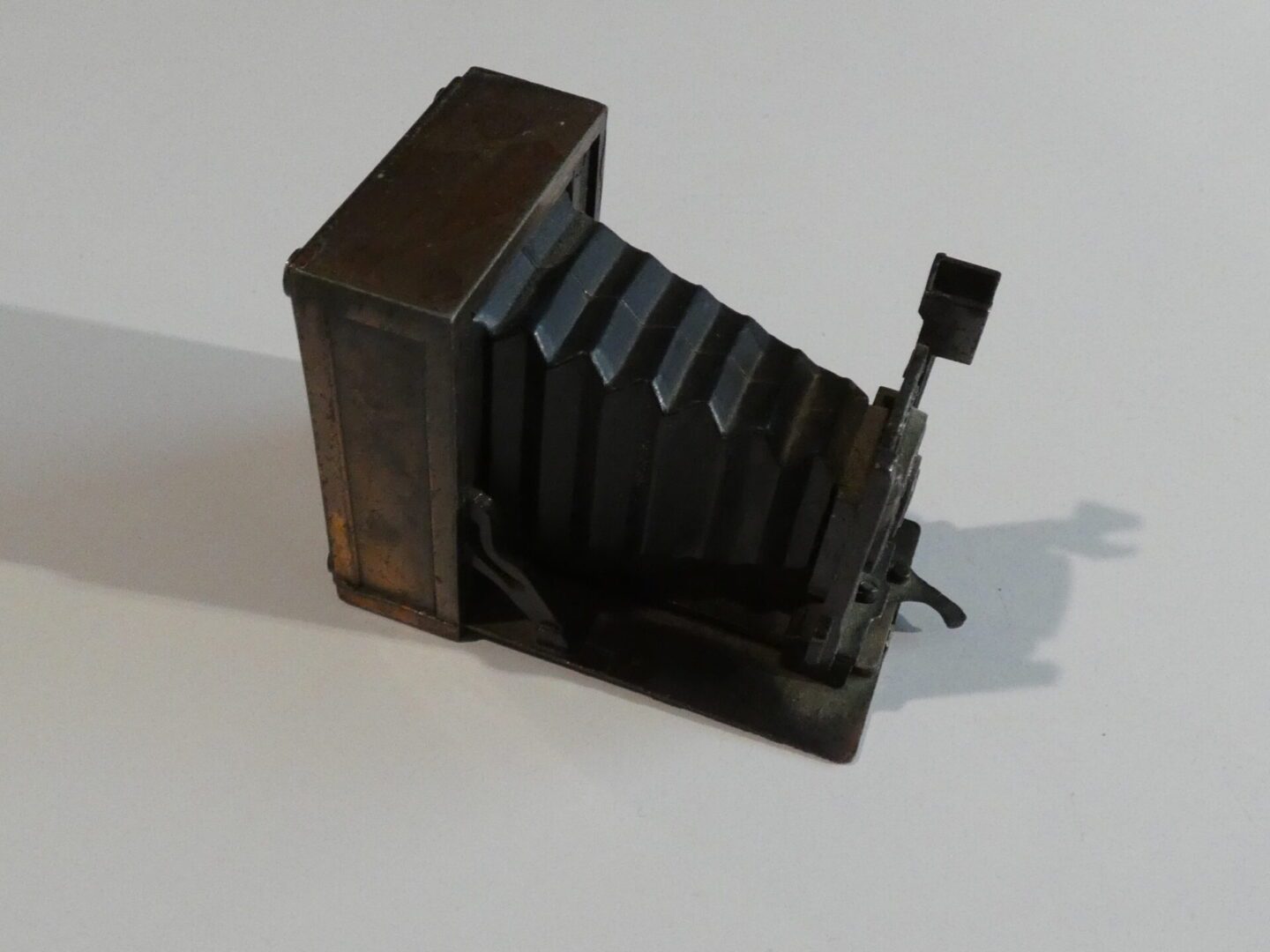 Vintage metal camera pencil sharpener.