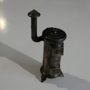 Vintage metal stovetop pencil sharpener.