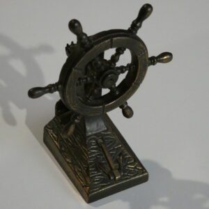 Metal ship wheel pencil sharpener.