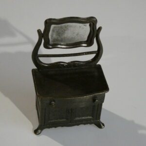 Antique metal vanity with mirror.