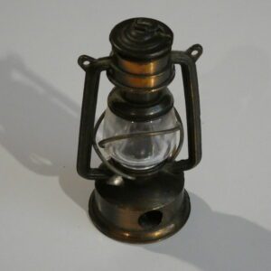 Vintage metal kerosene lamp pencil sharpener.