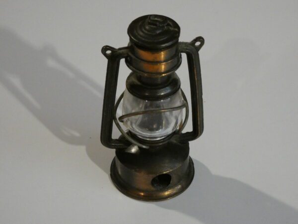 Vintage metal kerosene lamp pencil sharpener.