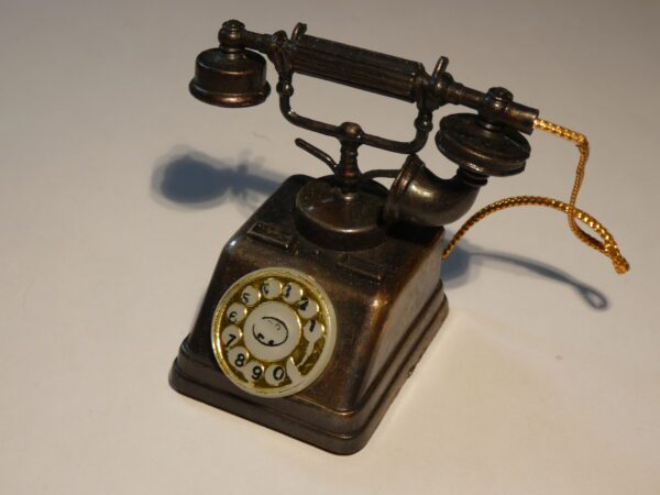 Vintage rotary phone pencil sharpener.