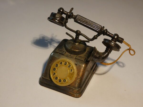 Vintage rotary phone pencil sharpener.