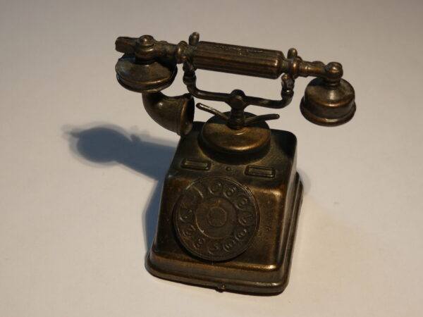 Antique rotary phone pencil sharpener.