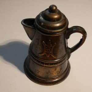 Vintage metal coffee pot pencil sharpener.