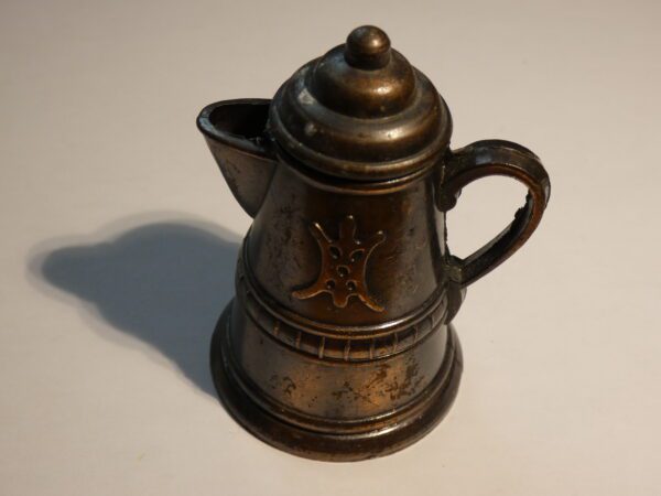 Vintage metal coffee pot pencil sharpener.