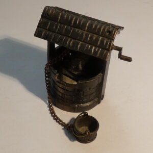 Metal well pencil sharpener with bucket.