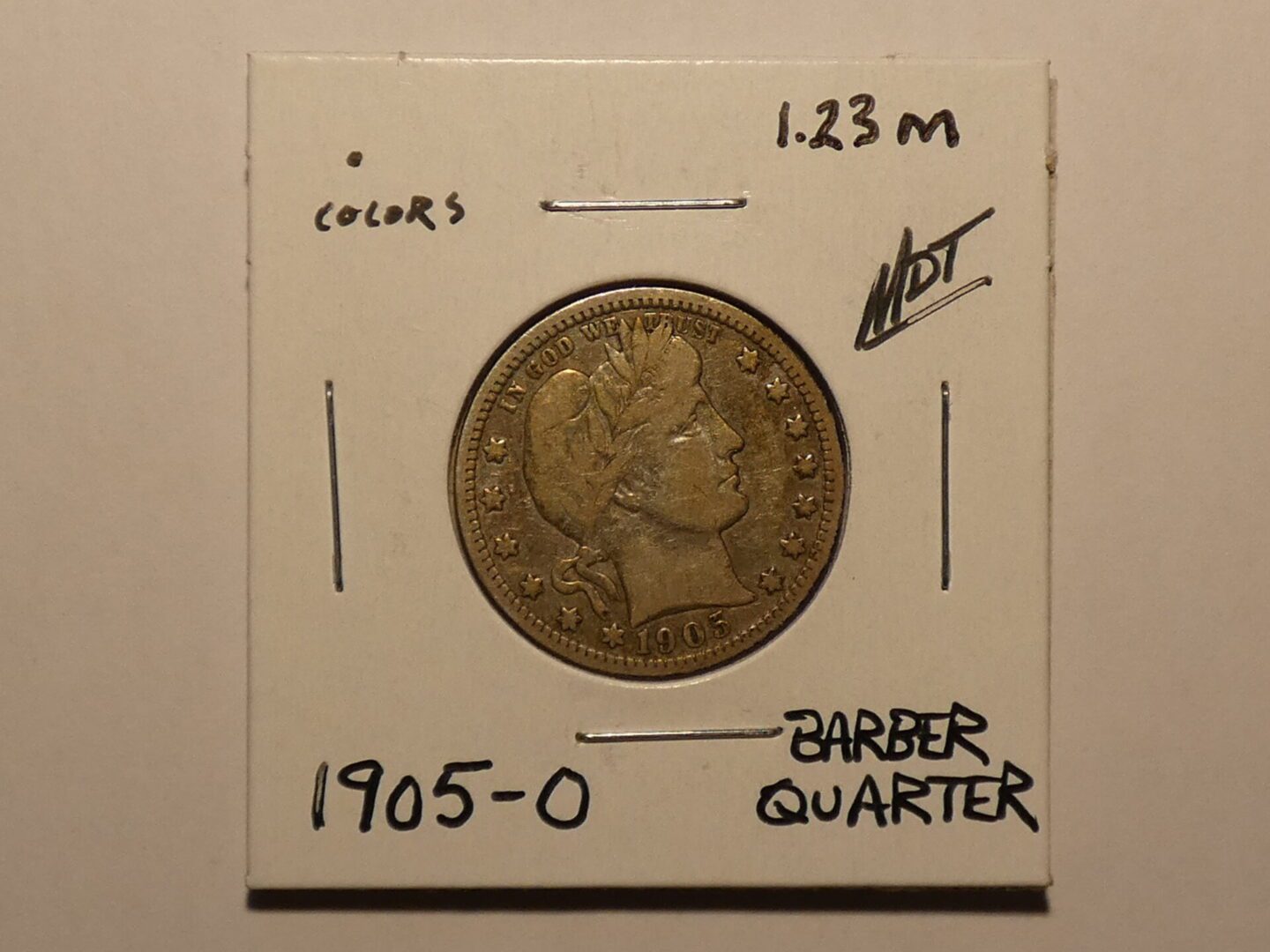 1905 Barber quarter coin in holder.