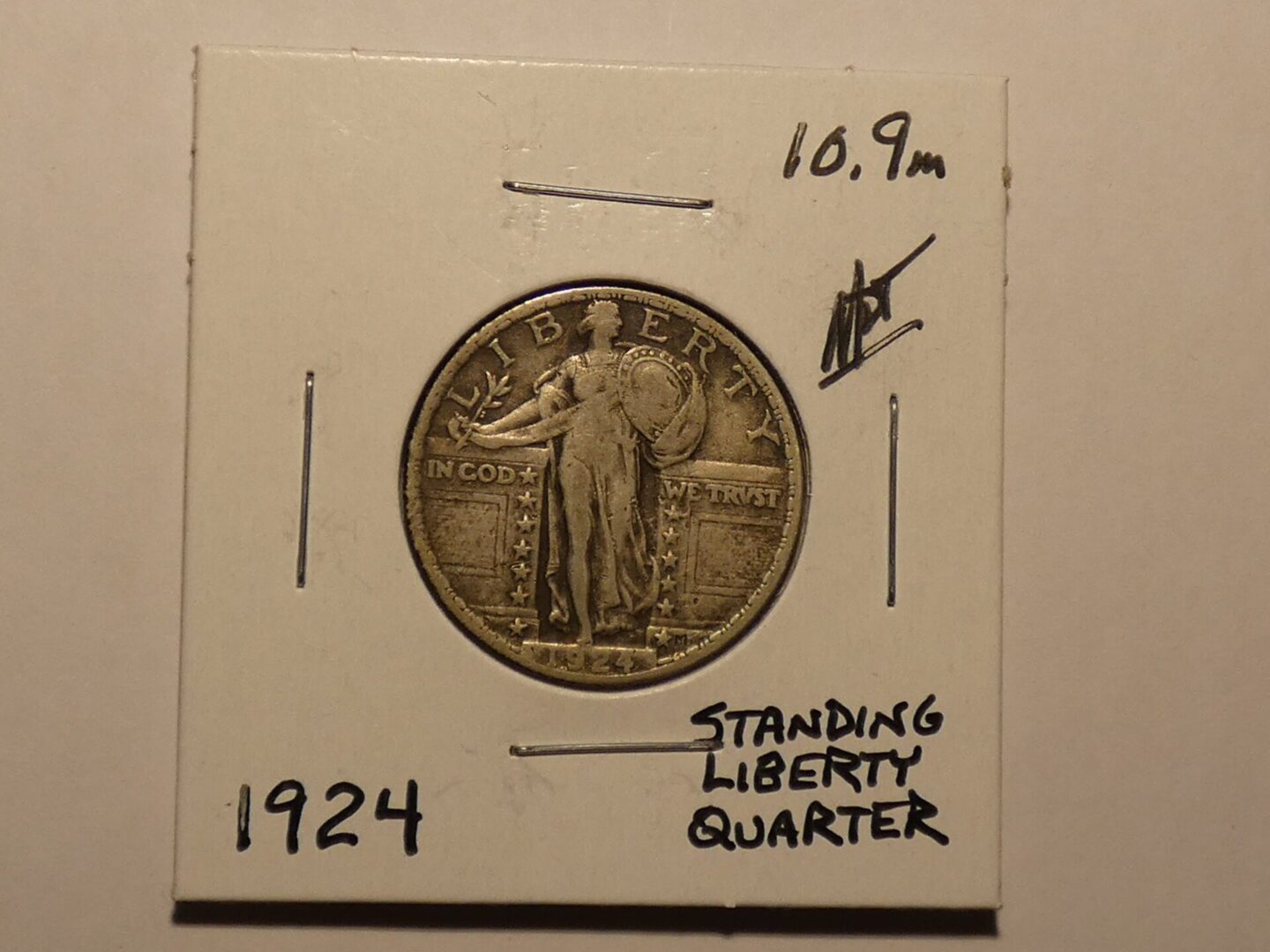 1924 Standing Liberty quarter coin.